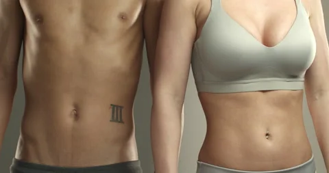 Cropped close-up shot of two athletes, female and male sportsmen bodies Stock Footage 137410254