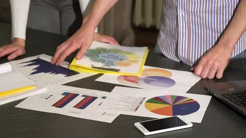 Cropped close up of a table at the corporate office full of business diagrams Video stock 84777200