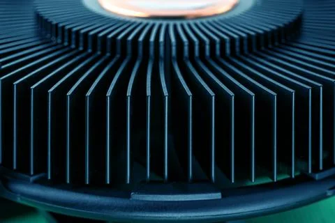 Cropped computer CPU cooling fan radiator toned turquoise blue green. Stock Photos