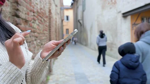 Cropped female using smartphone touching screen Stock Footage 166300391