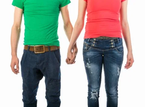 Cropped front view image of a man and woman in casual clothing holding hands  Stock Photos