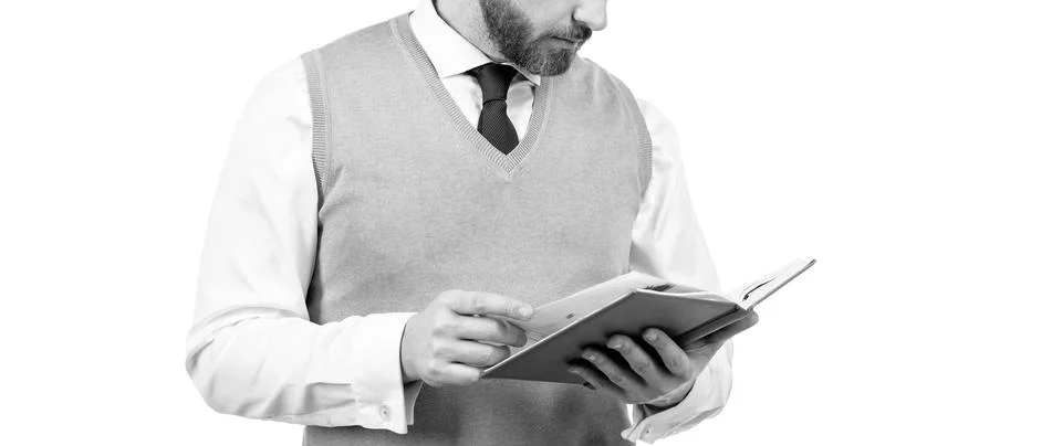 Cropped guy reading planner isolated on white background, education Fotos Stock