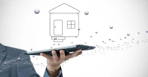 Cropped hand holding digital tablet with home symbol and connecting dots Stock Photos