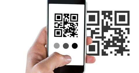 Cropped hand scanning qr code with smart phone with copy space over white 스톡 사진