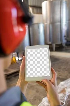 Cropped hands of female technician using digital tablet 写真素材