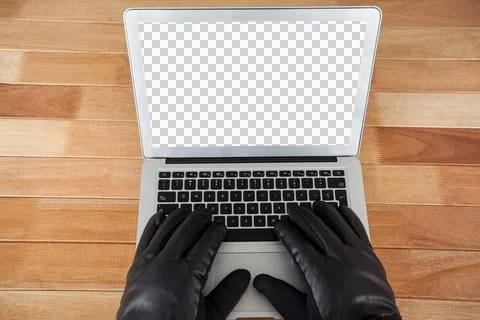 Cropped hands of hacker using laptop Stock Photos