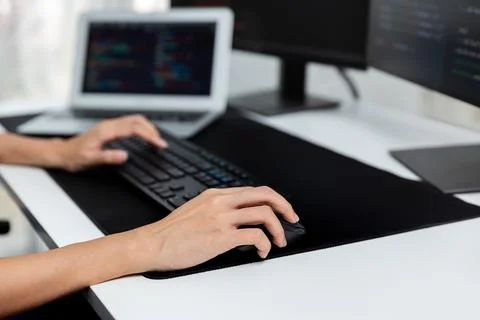 Cropped hands image of IT creating with typing information on pc. Stratagem. 写真素材