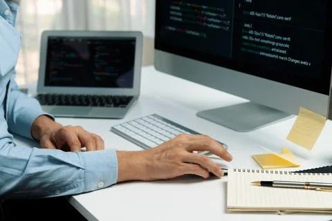 Cropped hands IT developer working online software information on pc. Pecuniary. 스톡 사진