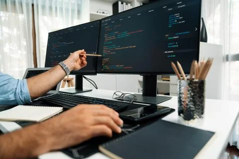 Cropped hands pointing of IT developer data software development on pc. Surmise. 库存照片