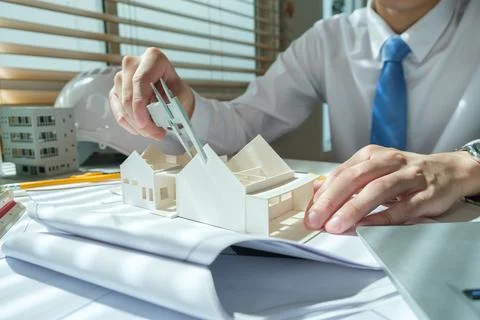 Cropped image of Architect man working on project in office for architectur.. Stock Photos