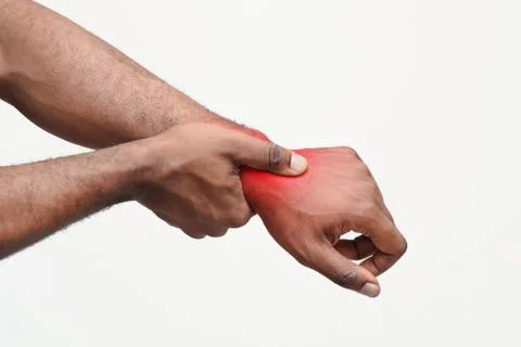 Cropped image of black guy suffering from rheumatism Stock Photos