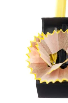 Cropped image of black sharpener and pencil Foto stock