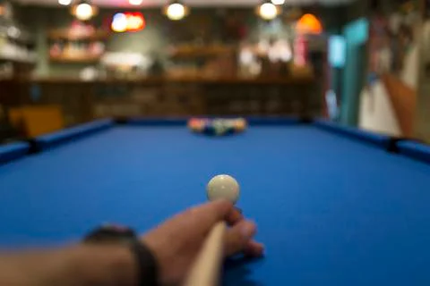Cropped image of hand playing pool Foto stock