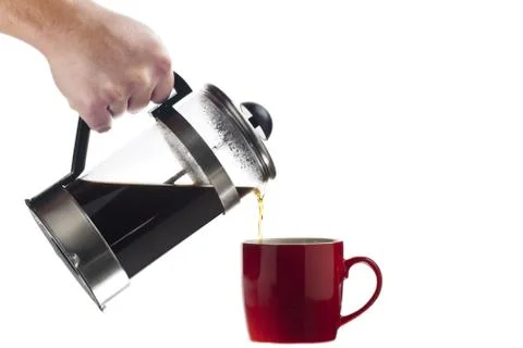 Cropped image of a human hand serving coffee Stock Photos