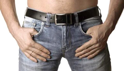 Cropped image of man in jeans closeup on white background Stock Photos