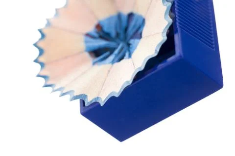Cropped image of pencil sharpener and dust Stock Photos