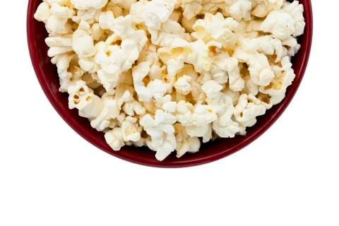 Cropped image of a popcorn inside the red bowl Stock Photos
