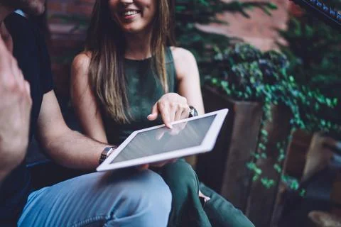 Cropped image of users browsing website Stock Photos