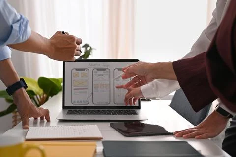 Cropped image of web developer team collaborating and planning template layout Stock Photos