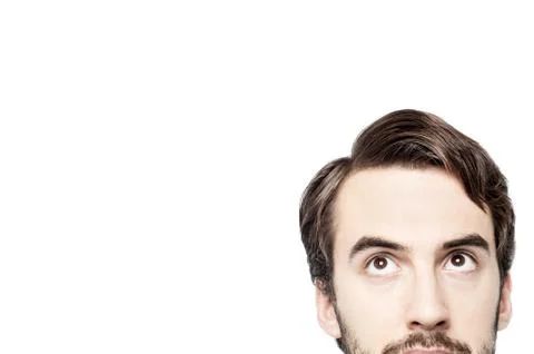 Cropped image of young man looking up Stock Photos