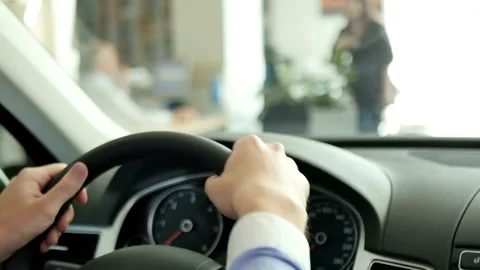 Cropped of man driving car, over shoulder shot. hands on steering wheel inside Vídeo Stock 336265555