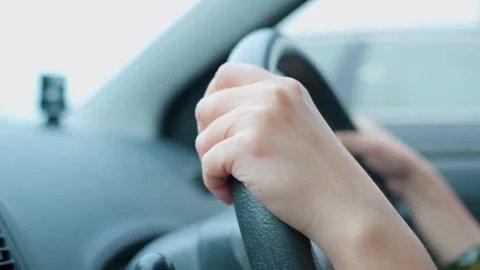 Cropped shot of man with his hands on steering wheel, driving his car. Stock-Footage 336268729