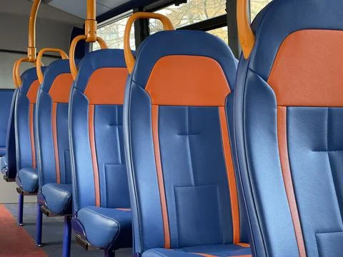 Cropped shot of rows of empty bus seats Stock Photos