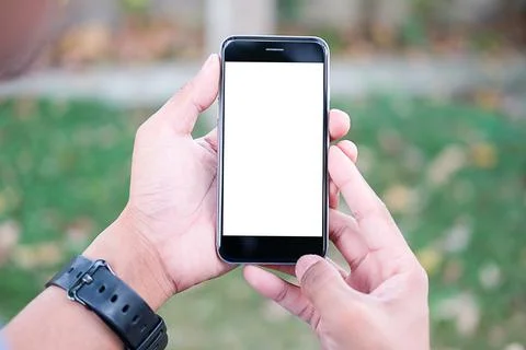 Cropped shot view of man hands holding smart phone with blank copy space scre Foto stock