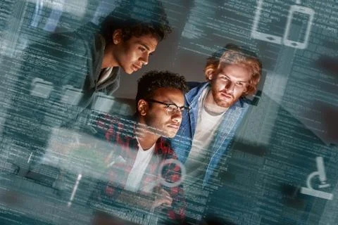 Cropped shot of young developers working overtime Stock-Fotos