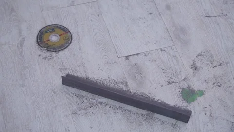 Cropped square and saw on the floor Stock Footage 86460180