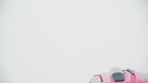 Cropped video of female pulling a suitcase packed according to all flight Stock Footage 134470872