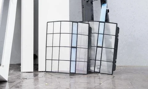 Cropped view on air filter after cleaning dust. Filtration concept. Stock Photos
