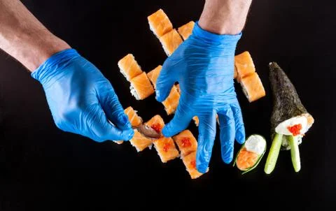 Cropped view of chef preparing sushi Stock Photos