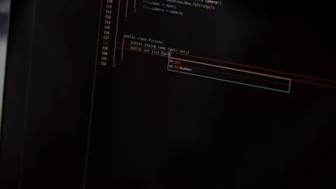 Cropped view of computer screen with website code. A web developer reviews and Stock Footage 237182992