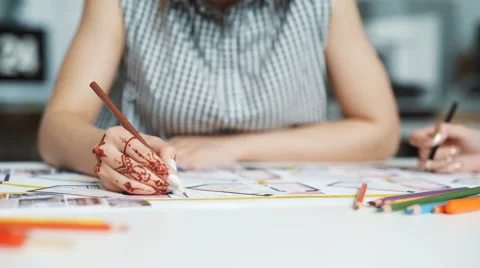 Cropped view of female architect drawing line on blueprint Stock Footage 62764871