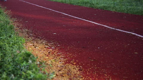 Cropped view of man running on running track Stock-Footage 133934447