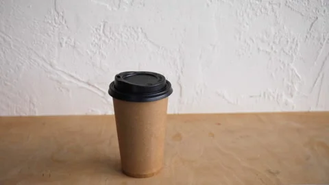 Cropped view of man taking paper cup Stock-Footage 132444840