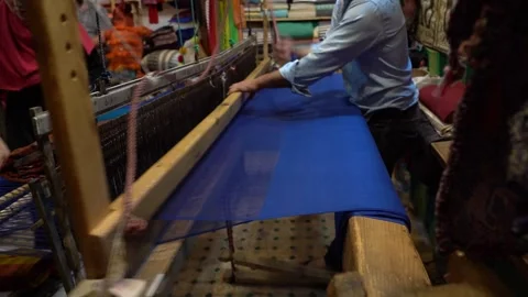 Cropped View Of A Man Weaving A Woolen Rug On Loom. Close-up Shot Stock Footage 304101371