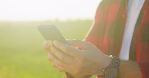 Cropped view of the optimistic caucasian farmer scientist in plaid shirt using Stock Footage 157646151