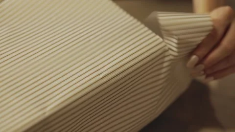Cropped View Of A Person Cutting A Gift Wrapper Using Scissors. Close-up Shot Stock Footage 332819674
