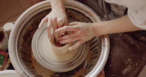 Cropped view of potter's hands making beautiful handmade product on throwing Stock Footage 207071112