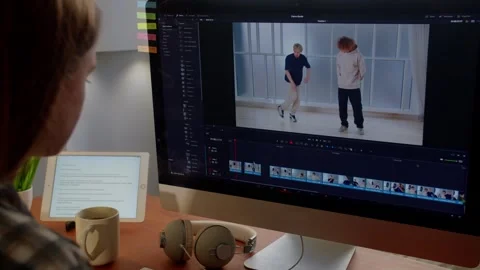 Cropped view of video editor working with computer. Video post production Stock Footage 240471643