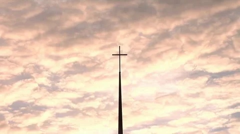 Cross against moving clouds Stock Footage 12207751