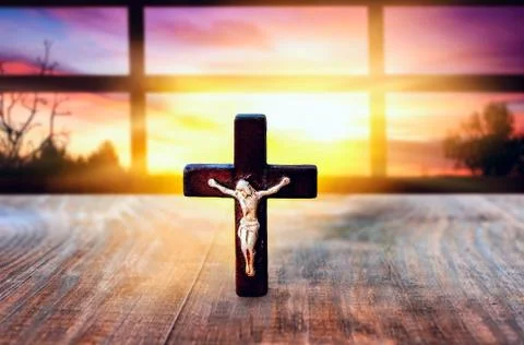 Cross against a window Stock Photos