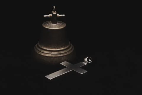 Cross and bell. Stock Photos