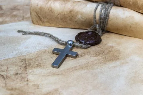Cross and medieval scrolls. Stock Photos