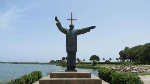 Cross and statue Stock Photos