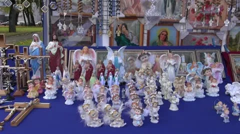 Cross, angels and other religious thematic objects in fair Stock Footage
