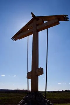 Cross on a background of blue sky Stock Photos