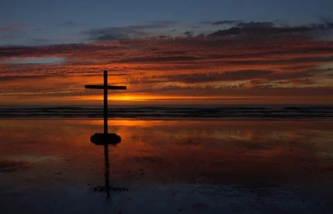 Cross beach reflection Stock Photos